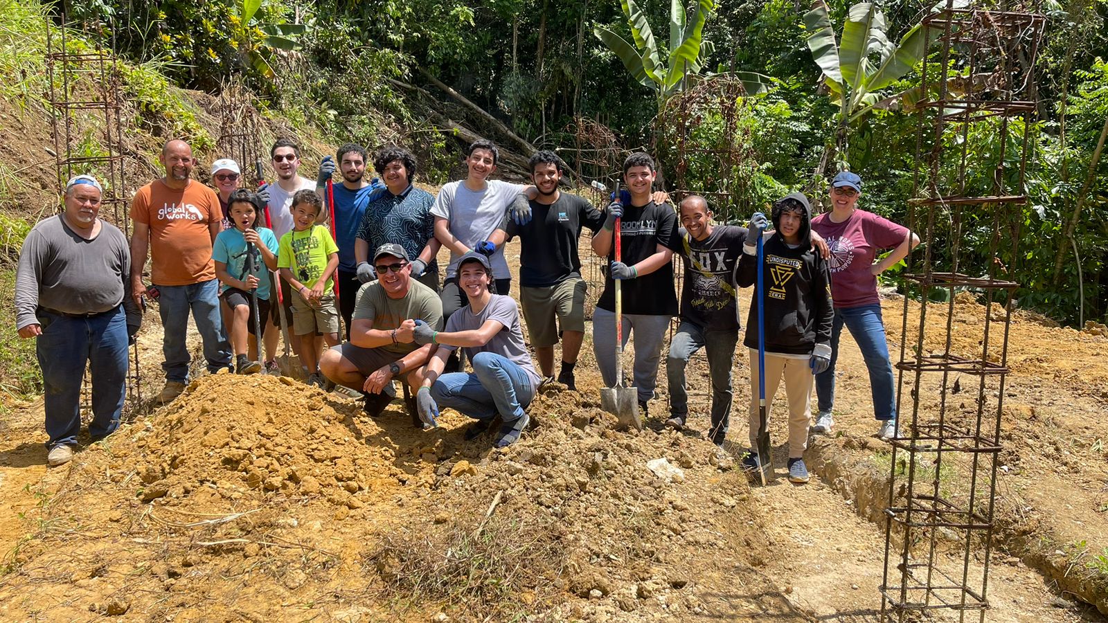 A group of ELC SABIC students pose for a group photo while helping rebuild a community in Puerto Rico devastated by a hurricane.