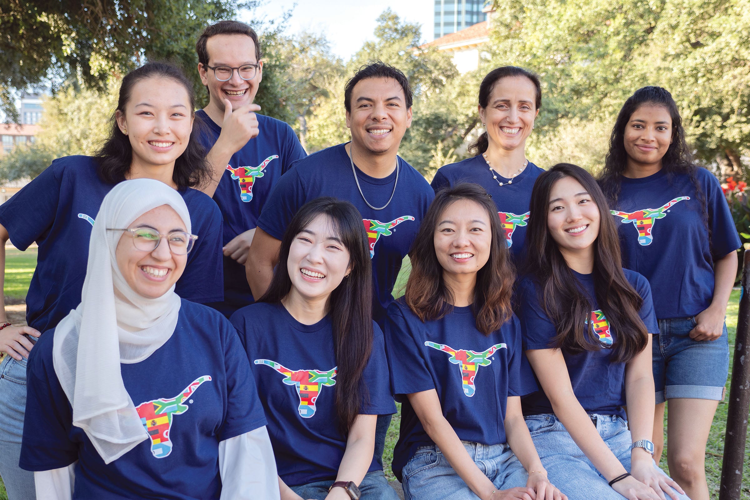 UT students pose with Texas Global shirts