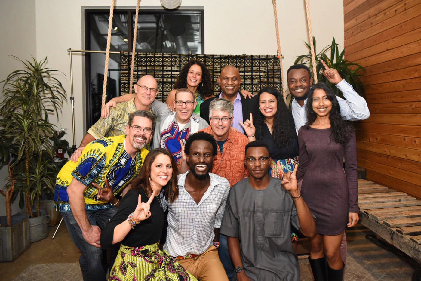 Rick Reeder and John Kidenda with ALB board members and scholarship recipients. Courtesy of African Leadership Bridge